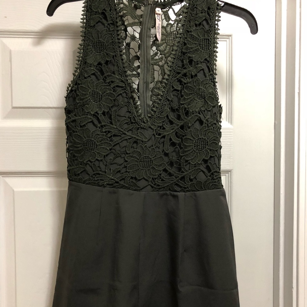 Dark green romper with lace detail